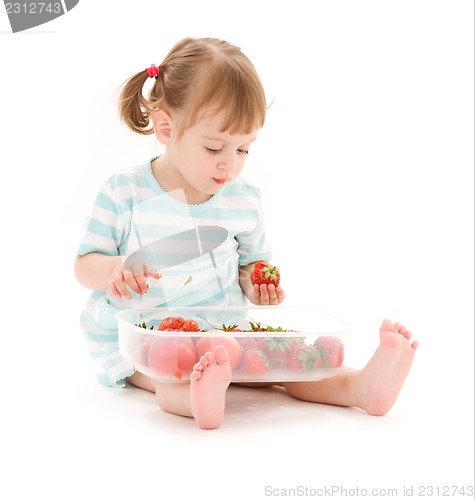 Image of little girl with strawberry