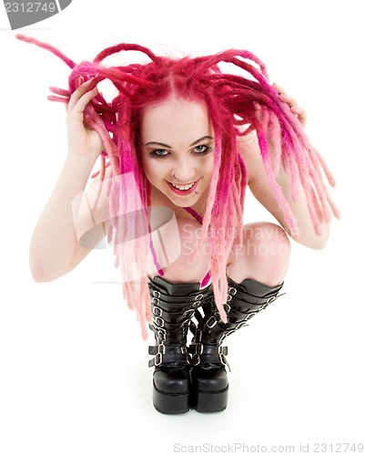 Image of pink hair girl in high boots