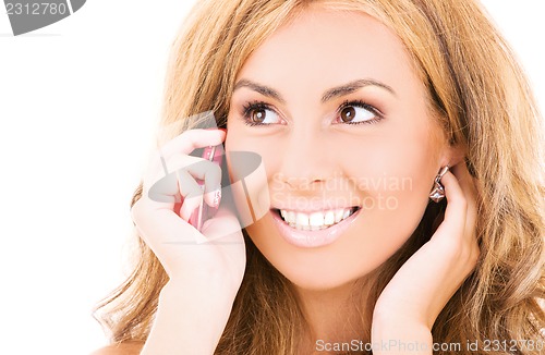 Image of happy woman with cell phone