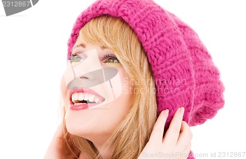 Image of happy teenage girl in hat