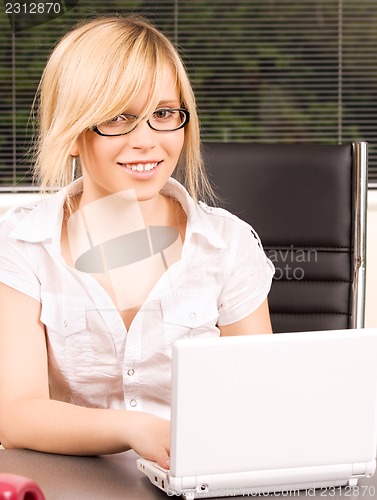 Image of office girl with laptop computer