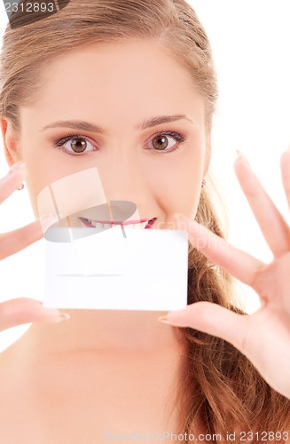 Image of happy girl with business card