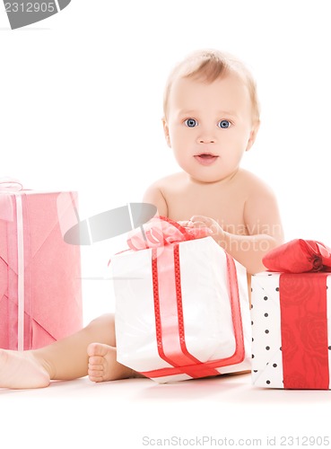 Image of baby boy with gifts