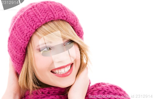 Image of happy teenage girl in hat