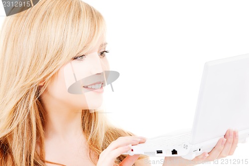 Image of teenage girl with laptop computer