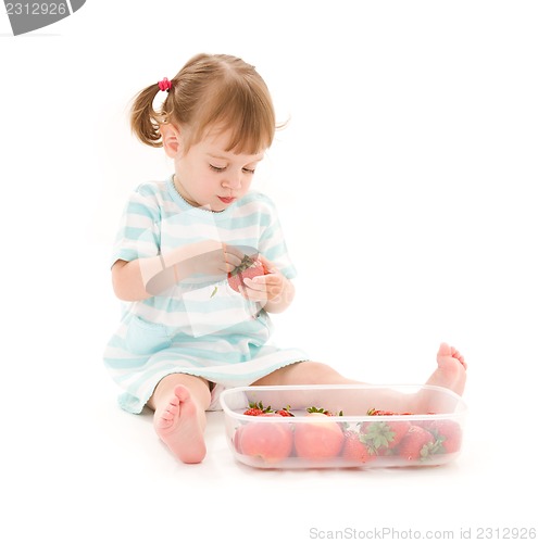Image of little girl with strawberry