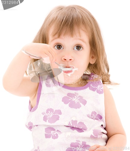 Image of little girl with yogurt