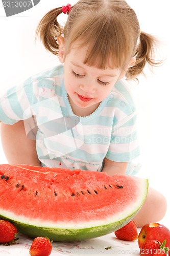 Image of little girl with strawberry and watermelon