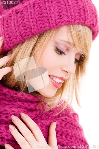 Image of happy teenage girl in hat