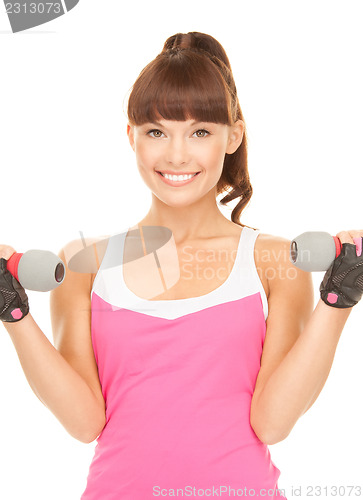 Image of fitness instructor with dumbbells