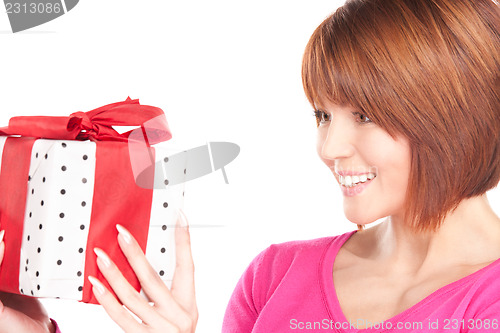 Image of happy woman with gift box