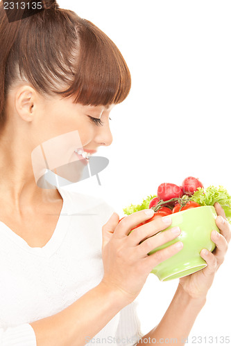 Image of beautiful housewife with vegetables