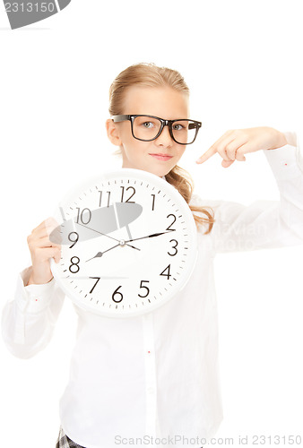 Image of girl holding big clock