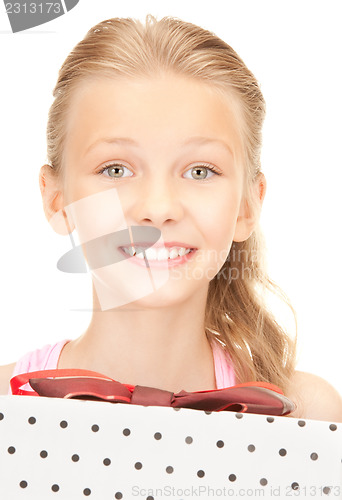 Image of happy girl with gift box