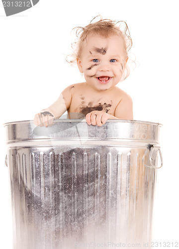 Image of baby in trash can