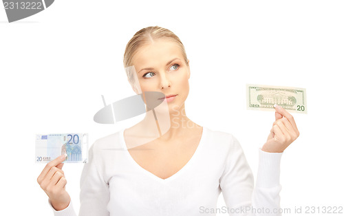 Image of woman with euro and dollar money notes