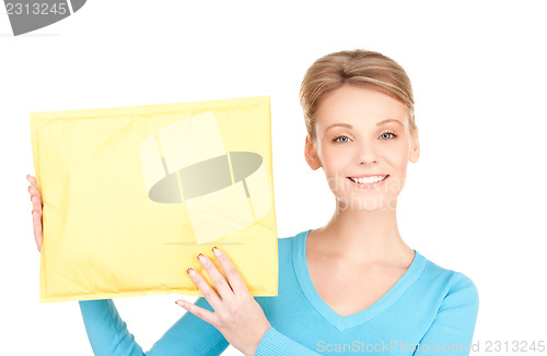 Image of businesswoman with parcel