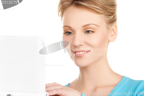 Image of happy woman with laptop computer