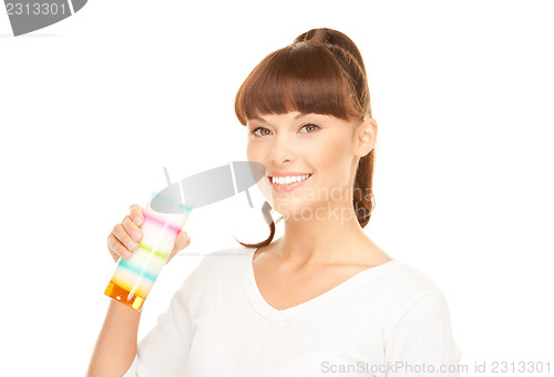 Image of lovely woman with glass of milk