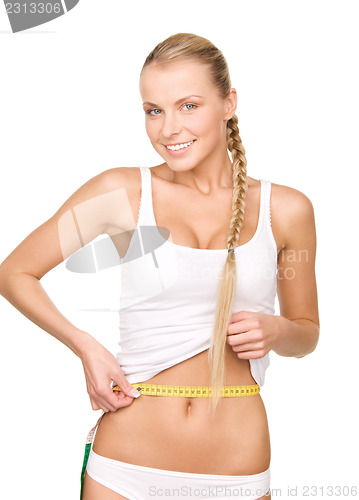 Image of beautiful woman with measure tape