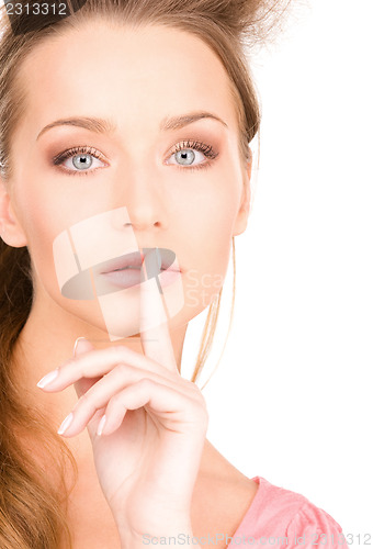 Image of finger on lips