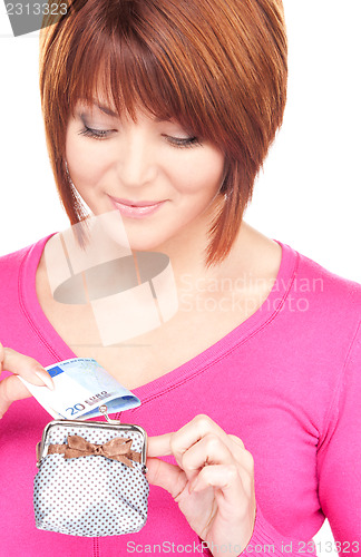 Image of lovely woman with purse and money