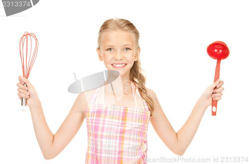 Image of little housewife with red ladle