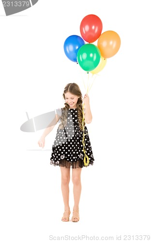 Image of happy girl with colorful balloons