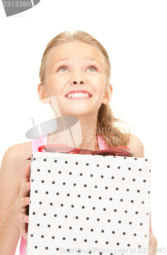 Image of happy girl with gift box