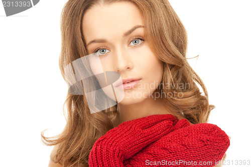 Image of beautiful woman in red mittens 