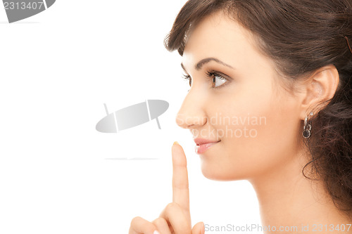 Image of finger on lips 