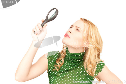 Image of woman with magnifying glass