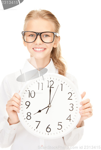 Image of girl holding big clock