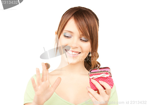 Image of lovely teenage girl with purse and money