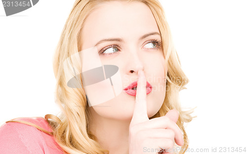 Image of finger on lips