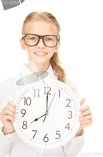 Image of girl holding big clock