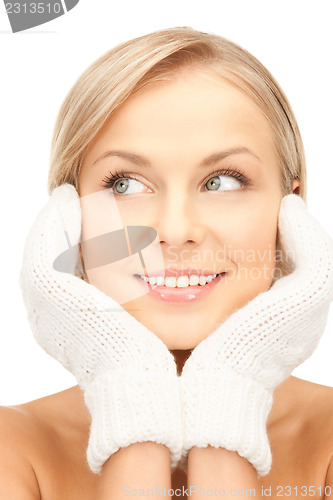 Image of beautiful woman in white mittens 