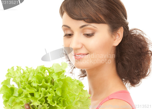 Image of woman with lettuce