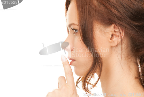 Image of finger on lips