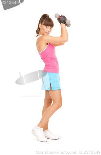 Image of fitness instructor with dumbbells