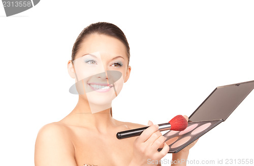 Image of lovely woman with palette and brush