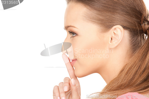 Image of finger on lips