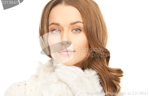 Image of beautiful woman in white gloves