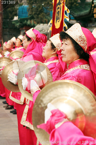 Image of Chinese New Year celebrations in Qingdao, China - performer at a