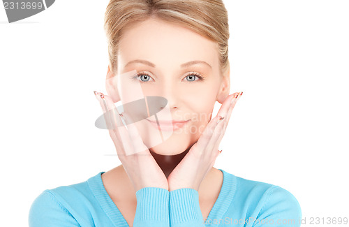 Image of woman showing hands with polished nails