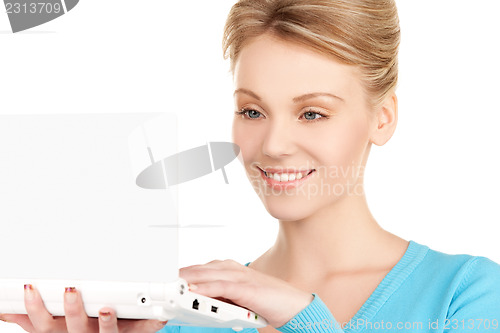 Image of happy woman with laptop computer
