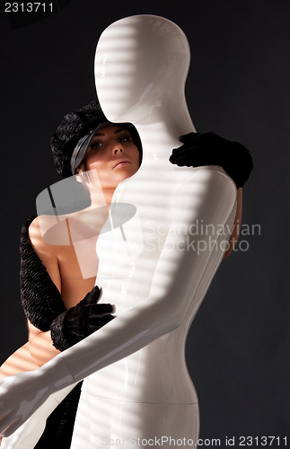 Image of woman with mannequin