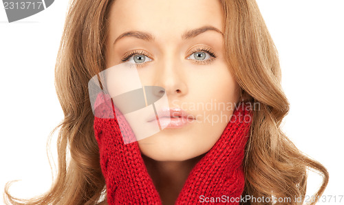 Image of beautiful woman in red mittens 