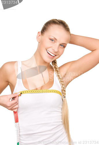 Image of beautiful woman with measure tape