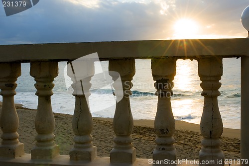 Image of sunset over the rail with flare